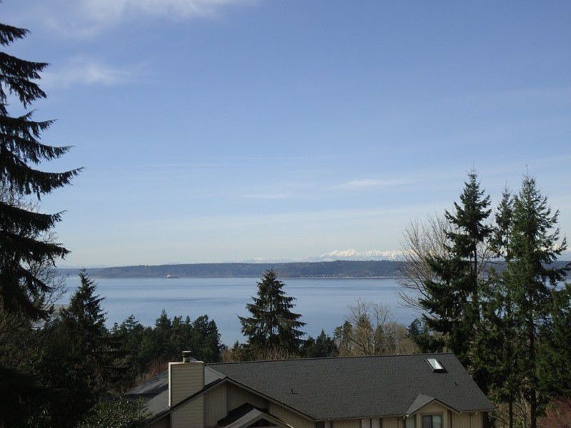 Enjoy a view of Puget Sound and the Olympics from this large lot in Ventana.