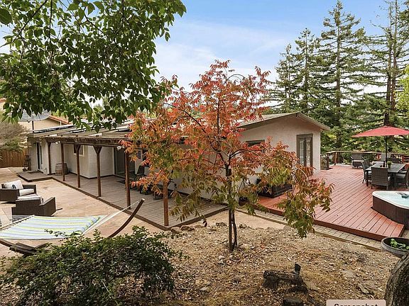 Plenty of outdoor deck space for entertaining and/or enjoying time in nature. Hot tub right off deck.