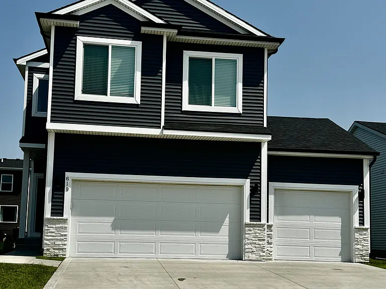 Front of Home and 3 car garage