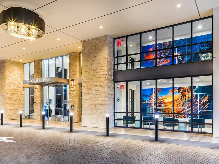 Front entry showcasing refined architecture and curated artwork.