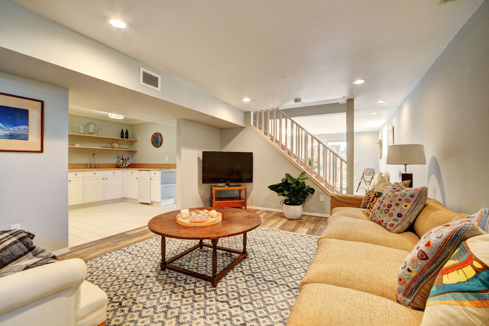  Guest suite also includes kitchenette/wet bar, living room, den and full bath.