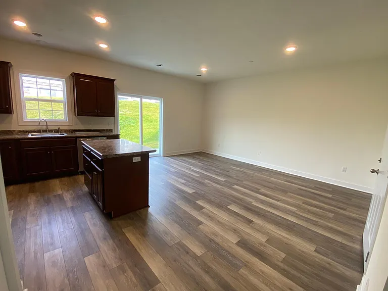 Kitchen looking to Family and Dining Area