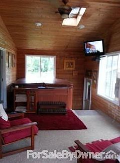 Four Season porch
						:
						Large hot tub. Sky light window.