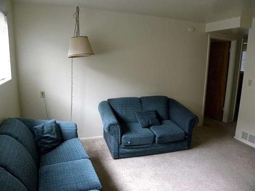 furnished hall with sofas