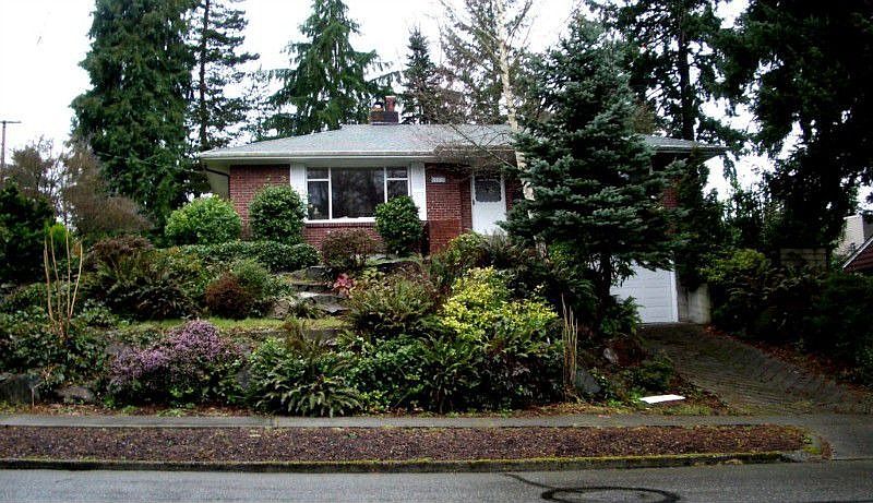 Wonderful home in the heart of Fircrest. Lovely yard with mature trees and brick accents. This home 