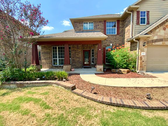 Walk-way to the front from driveway