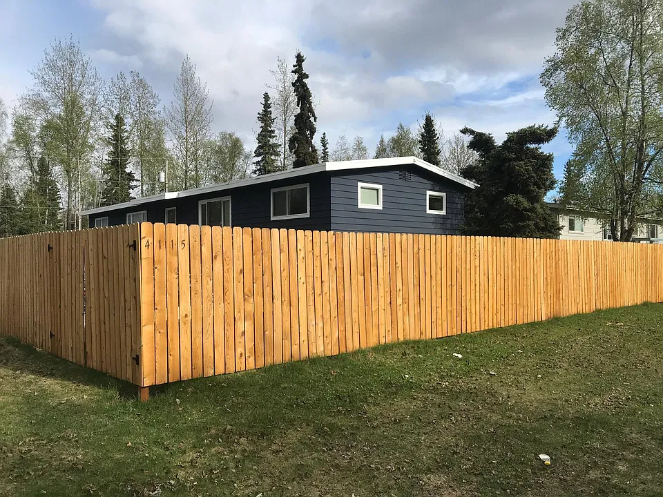 New Exterior Paint Job and cedar plank fence for privacy