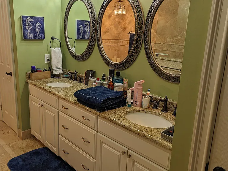 Master Bath. His and hers sinks and make up mirrors.
