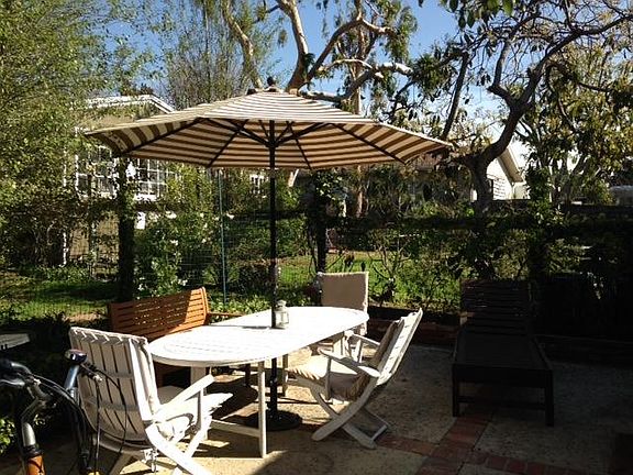 patio with full sun, also washer and dryer on patio grounds.