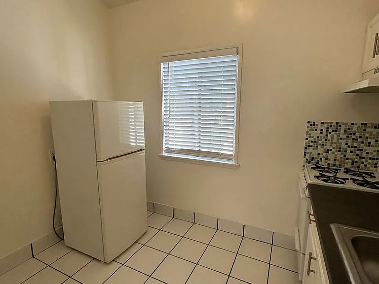 1702 Three Boys Apartments — Photo 10