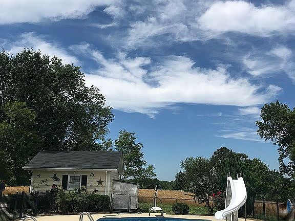 18x18 Pool with iron fence.