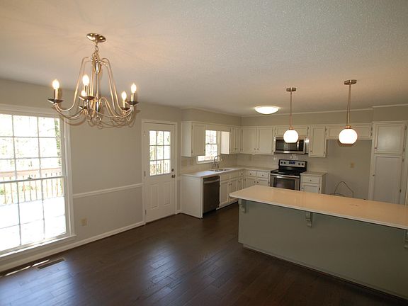 NEW OPENED UP KITCHEN AND DINING