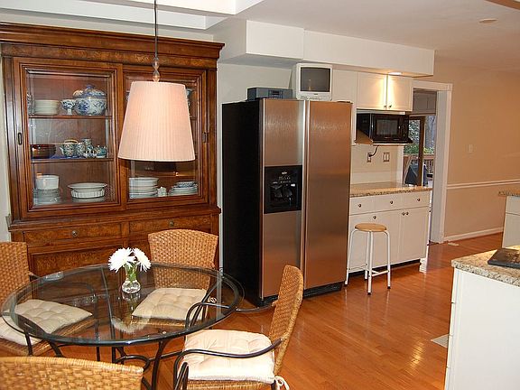 Kitchen with stainless steel fridge