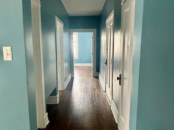 Entry hallway viewed from living/dining room