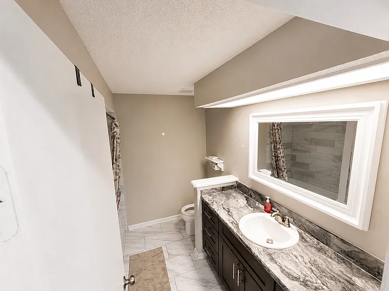 7855 Collins Ridge Blvd E — Photo 4