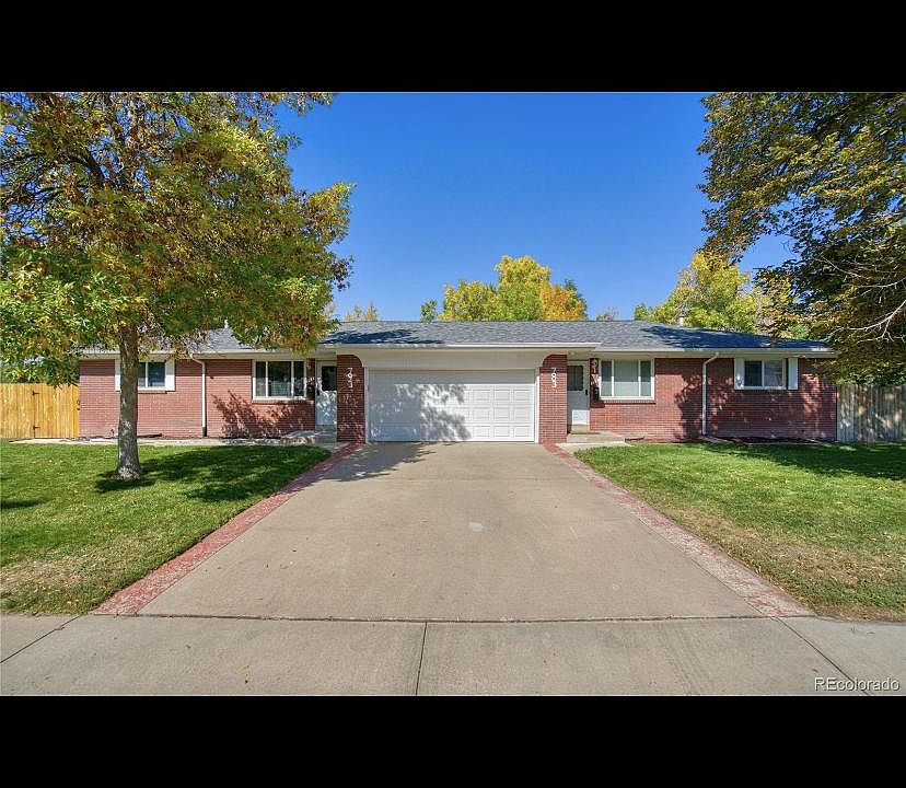 Photo of full duplex. Great curb appeal! The 3 bed/1.5 bath for rent is the right side of this photo. You'd be renting the upstairs and basement of the right side of duplex