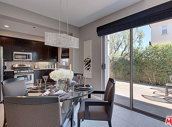 Dining Area & Kitchen (Private Patio in View)