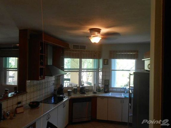 corian tops and stainless steel appliances
