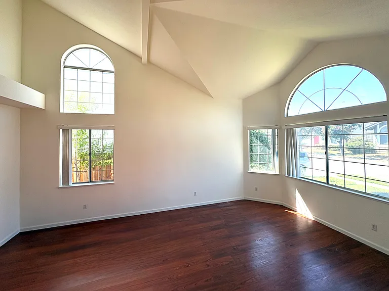 Bright Living Room with Vaulted Ceilings