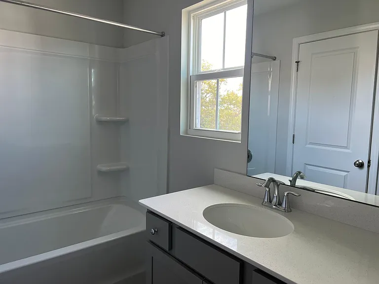 Shared full bathroom for bedrooms #2 and #3 on top floor
