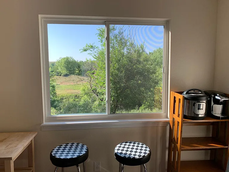 Summertime view of Fossil Trace golf course from the dining room