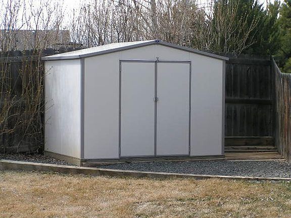 Vinyl shed in backyard