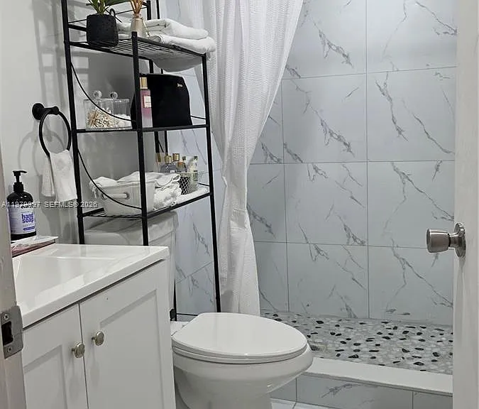 750 NE 199th St #101H — Photo 31