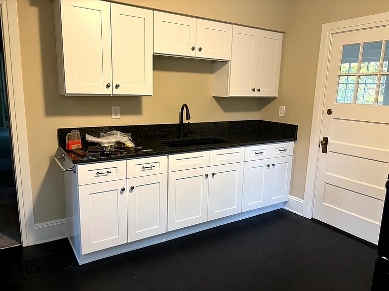 new granite counter and new cabinets