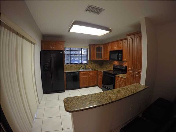 2nd image of 11420 SW 132nd Ct #11420