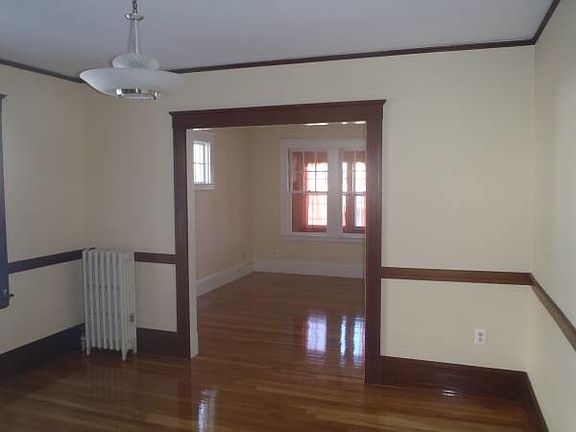 dining room with living room beyond