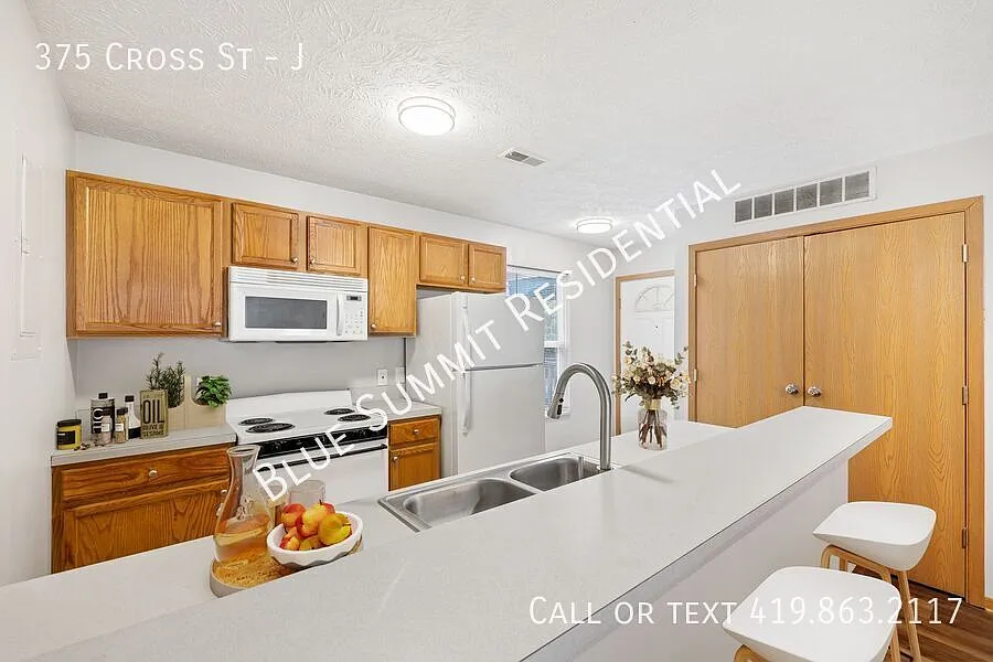 1BR Upper -Floor Unit with Private Patio — Photo 1
