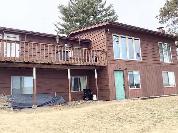 Back deck and all rooms in the house with lake views