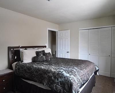Large master with wall closets.