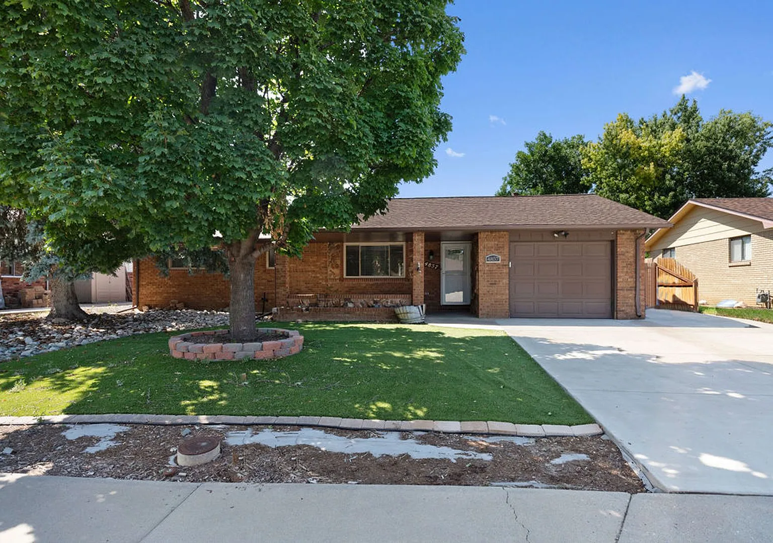 Charming 3-Bedroom Brick Ranch for Rent in Loveland! — Photo 1