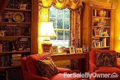 View from the Conservatory
						:
						This is a view of the house through our English Garden.