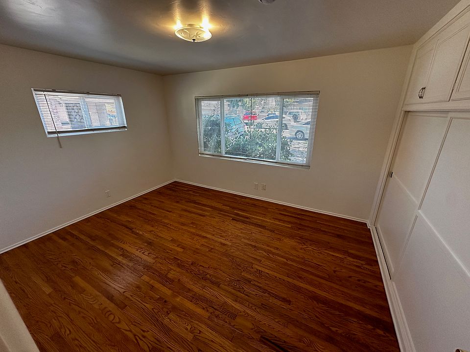 Spacious front bedroom with large closets.