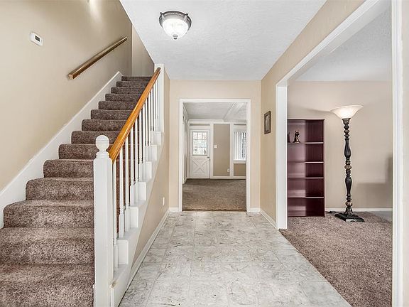 Upon entry you are greeted by both formals with the living RM to the right and dining RM to the left.