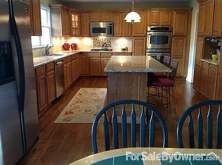 Kitchen
						:
						GE Profile gas appliances - stainless steel, double oven, granite counter tops