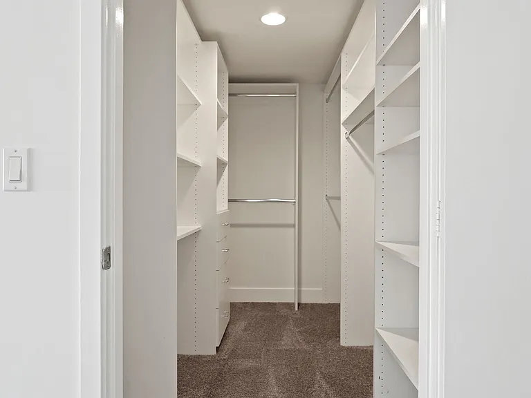 Walk-In Closet with Built-In Organizers