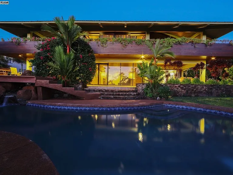 Jacuzzi Deck on the Left, above the waterfall into the Pool