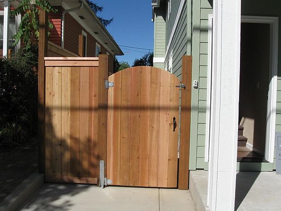 Secure, covered bike storage and sideyard.