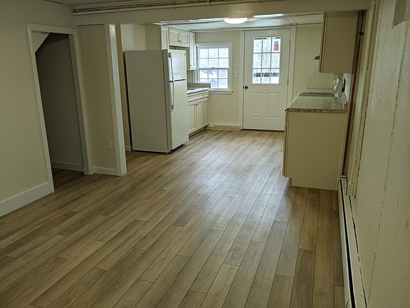 Kitchen from the Living Room (under the stairs storage closet)