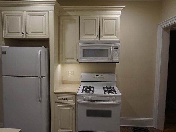 Fridge, Gas stove with built-in microwave, quartz countertop