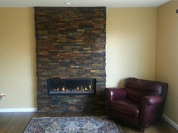 Living Room with 42 inch wide Gas Rock Fireplace