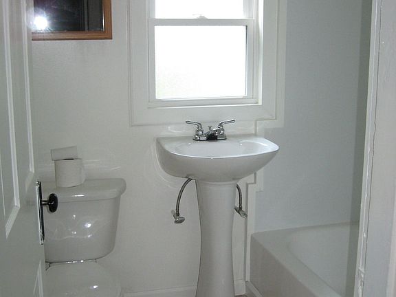 Second floor full bath with tub/shower.