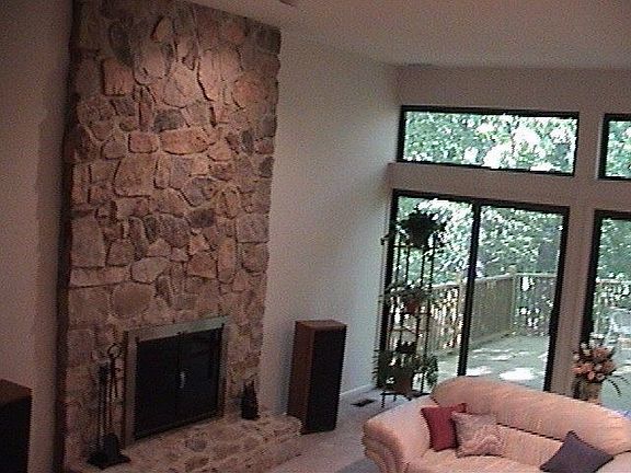 stone fireplace in living room