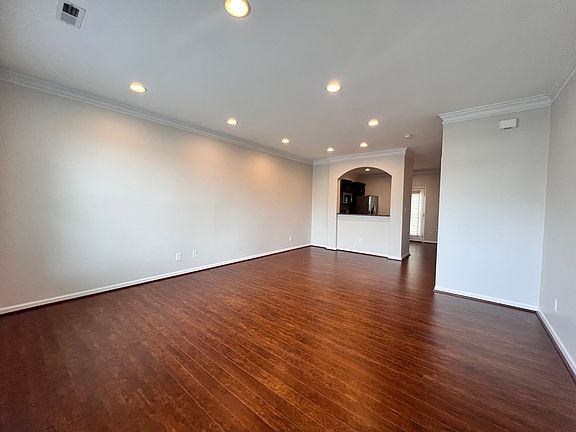 The living room and dining area from the front door.