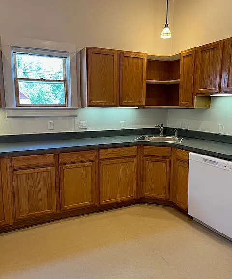 brand new dishwasher & large kitchen with tons of storage & natural light