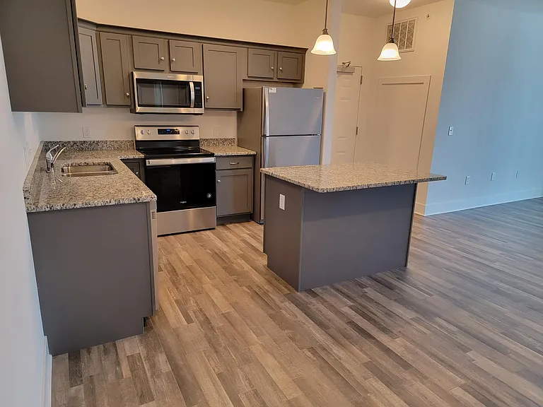 End Unit - Kitchen with Granite Countertops and Stainless Steel Appliances