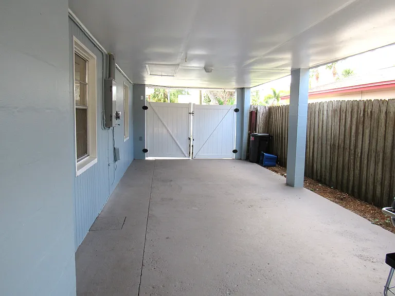 Covered carport and boat storage